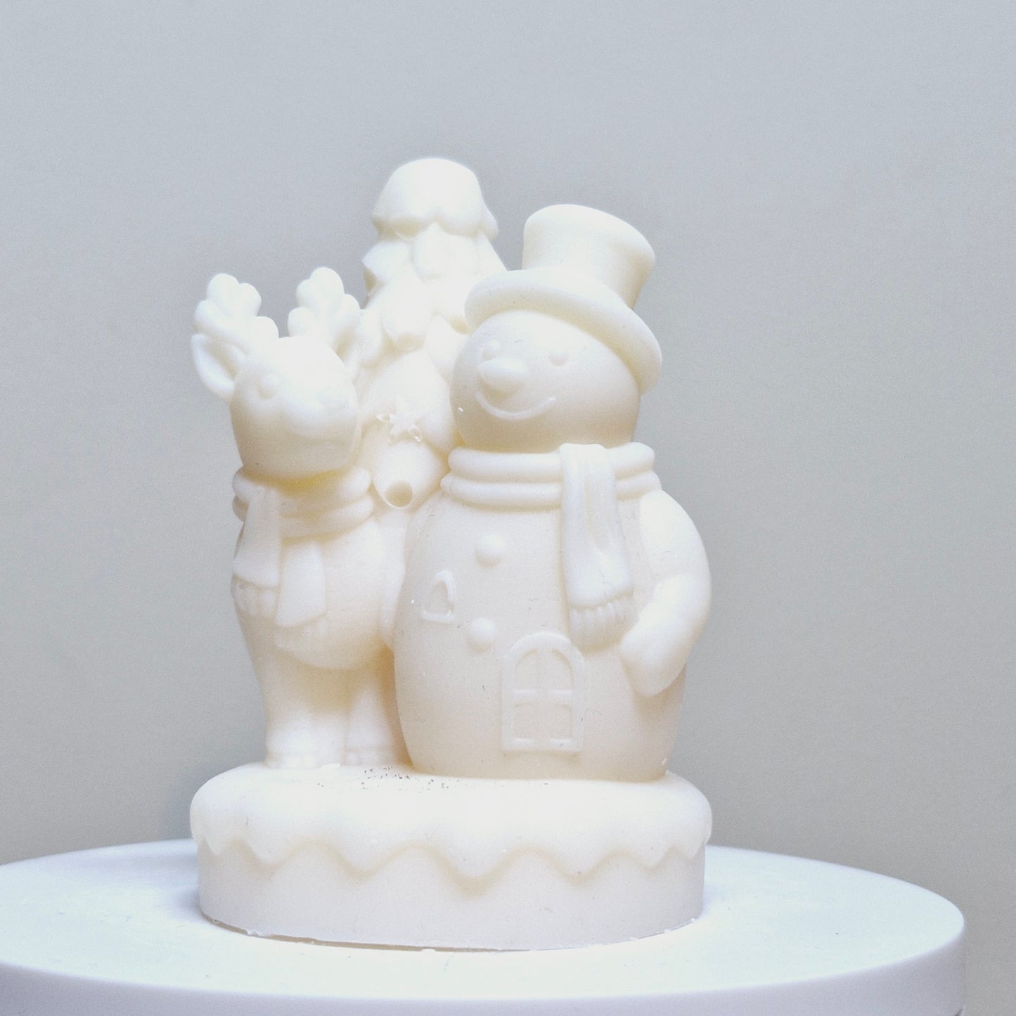 BOUGIE BONHOMME DE NEIGE AVEC RENNE