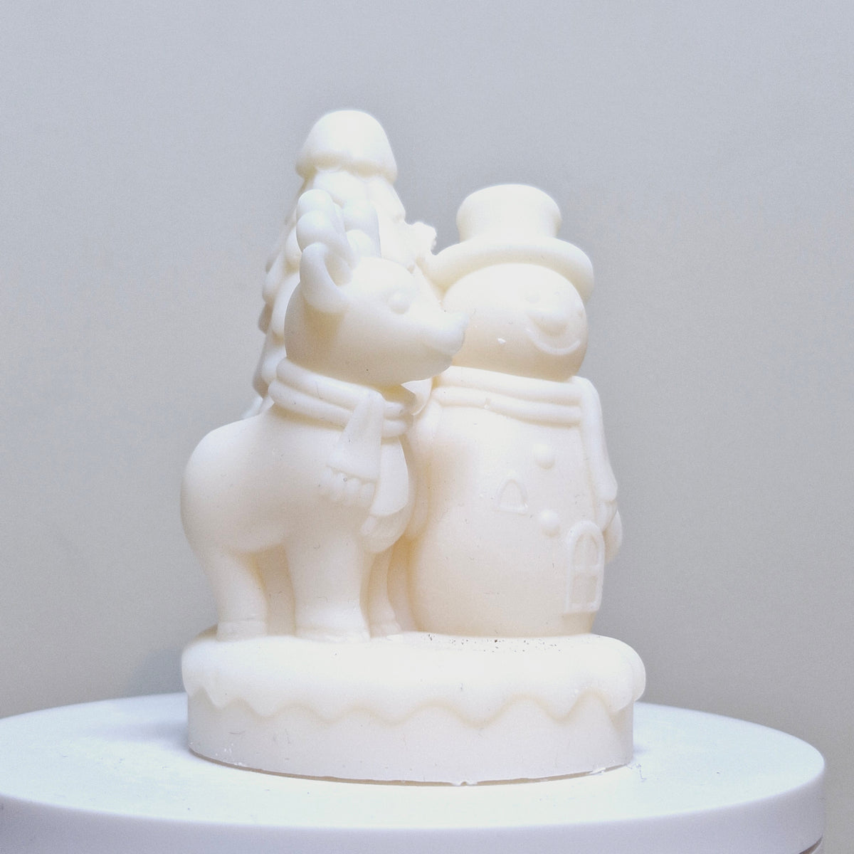 BOUGIE BONHOMME DE NEIGE AVEC RENNE