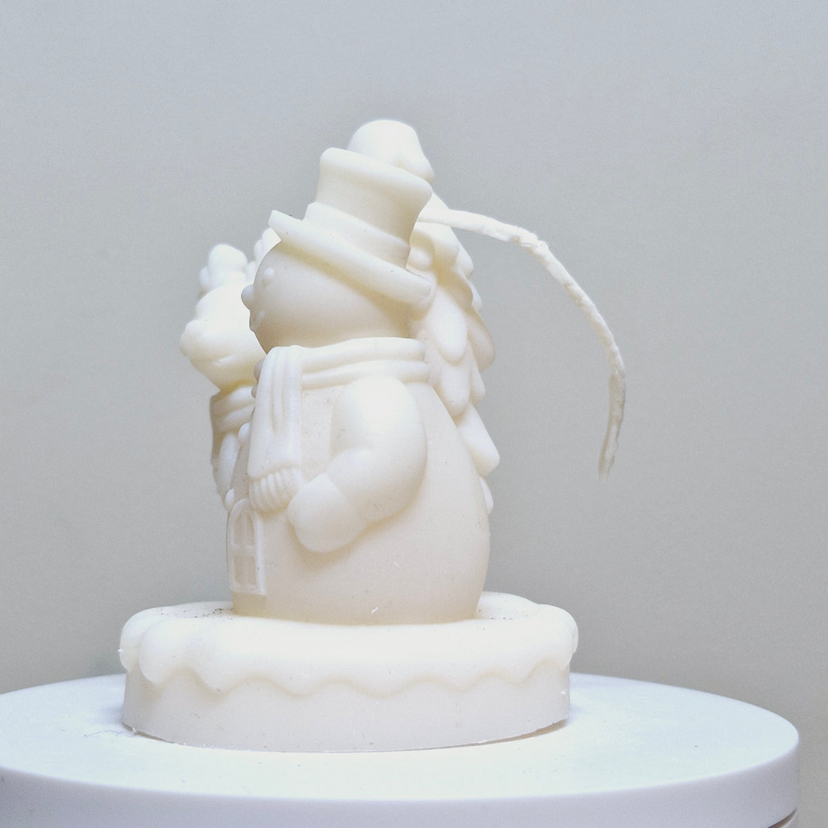BOUGIE BONHOMME DE NEIGE AVEC RENNE